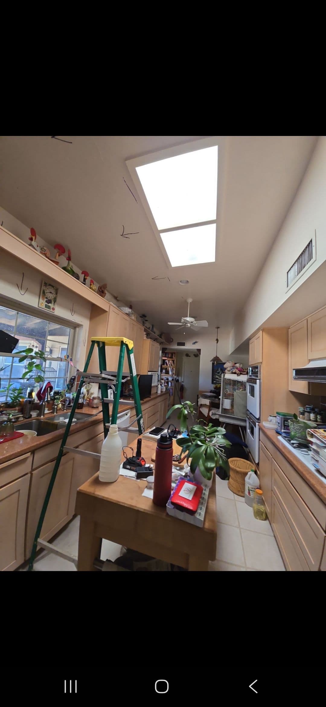 Gallery photos for A Small Roof Leak That Had Already Destroyed an Entire Kitchen Wall: Image #1