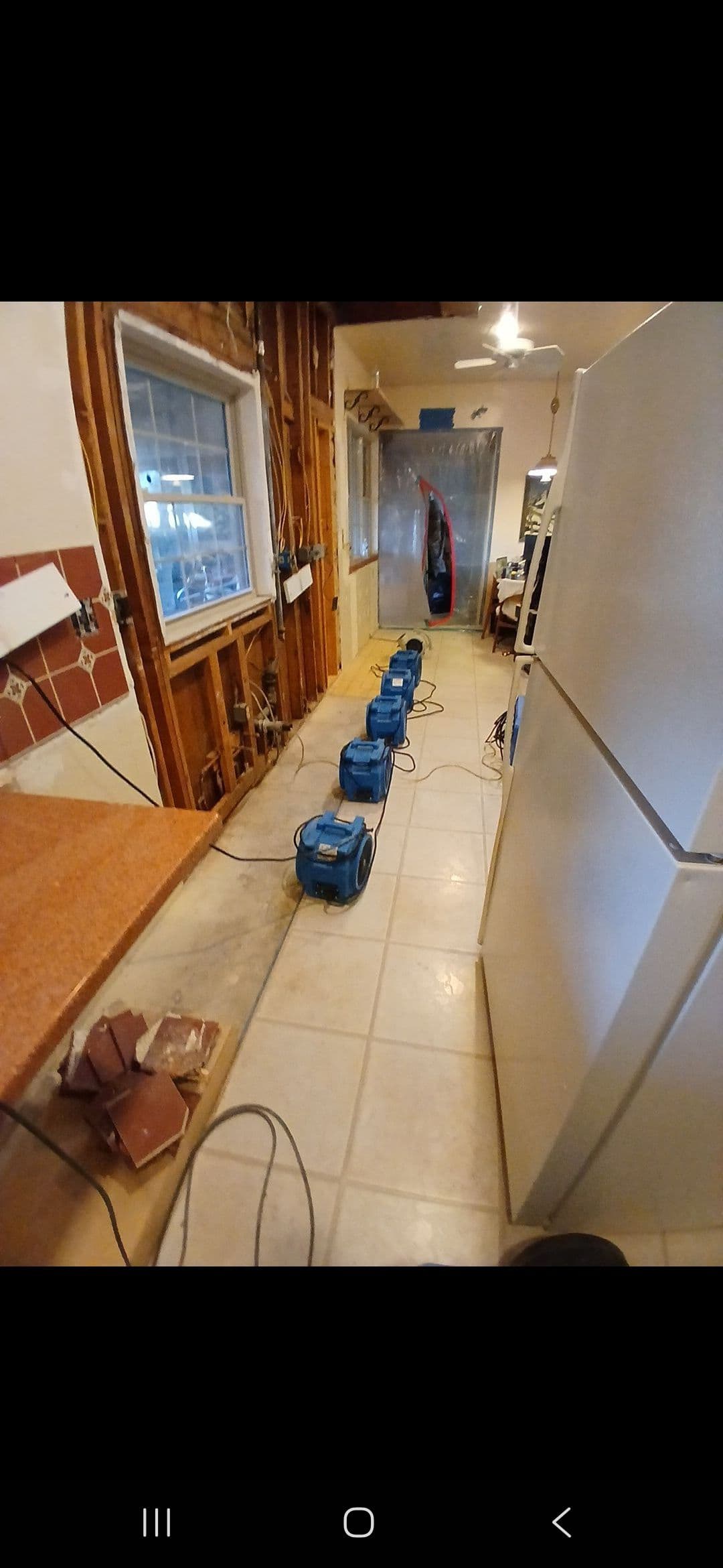 Gallery photos for A Small Roof Leak That Had Already Destroyed an Entire Kitchen Wall: Image #8