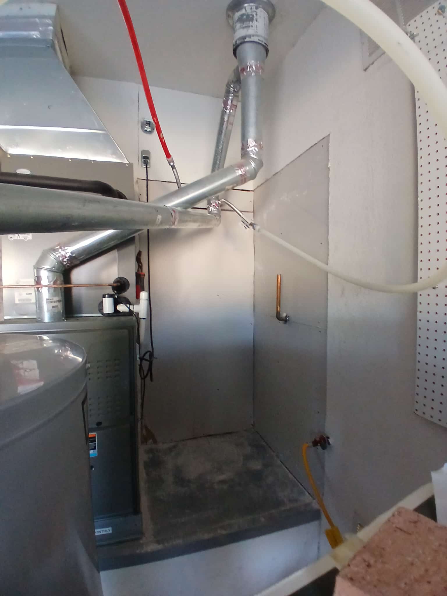 Gallery photos for Water Heater Failure Flooded This Garage - Here's How We Handled It: Image #9