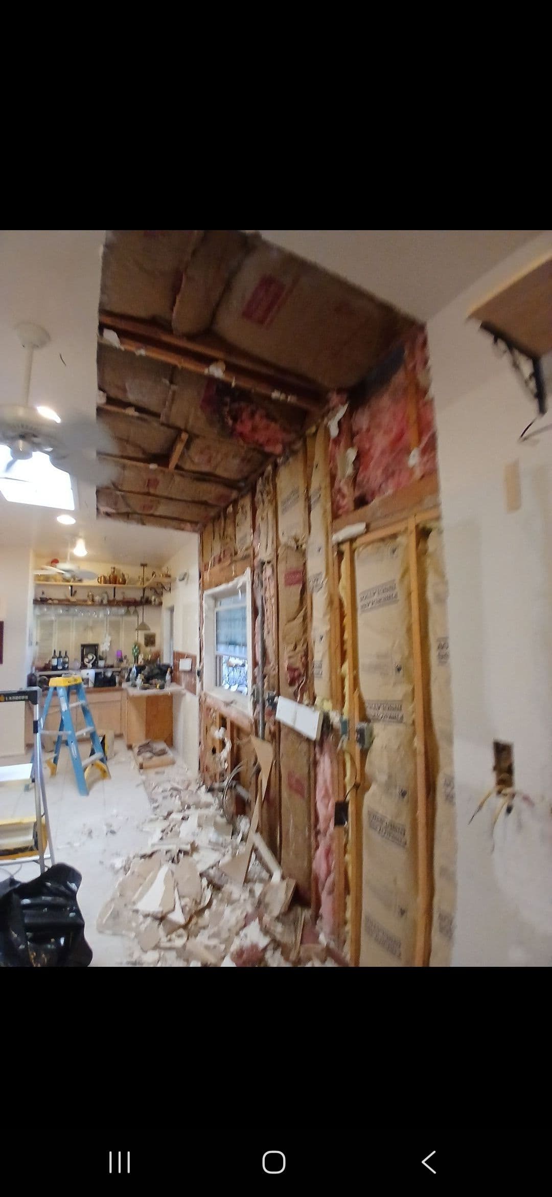 Gallery photos for A Small Roof Leak That Had Already Destroyed an Entire Kitchen Wall: Image #6
