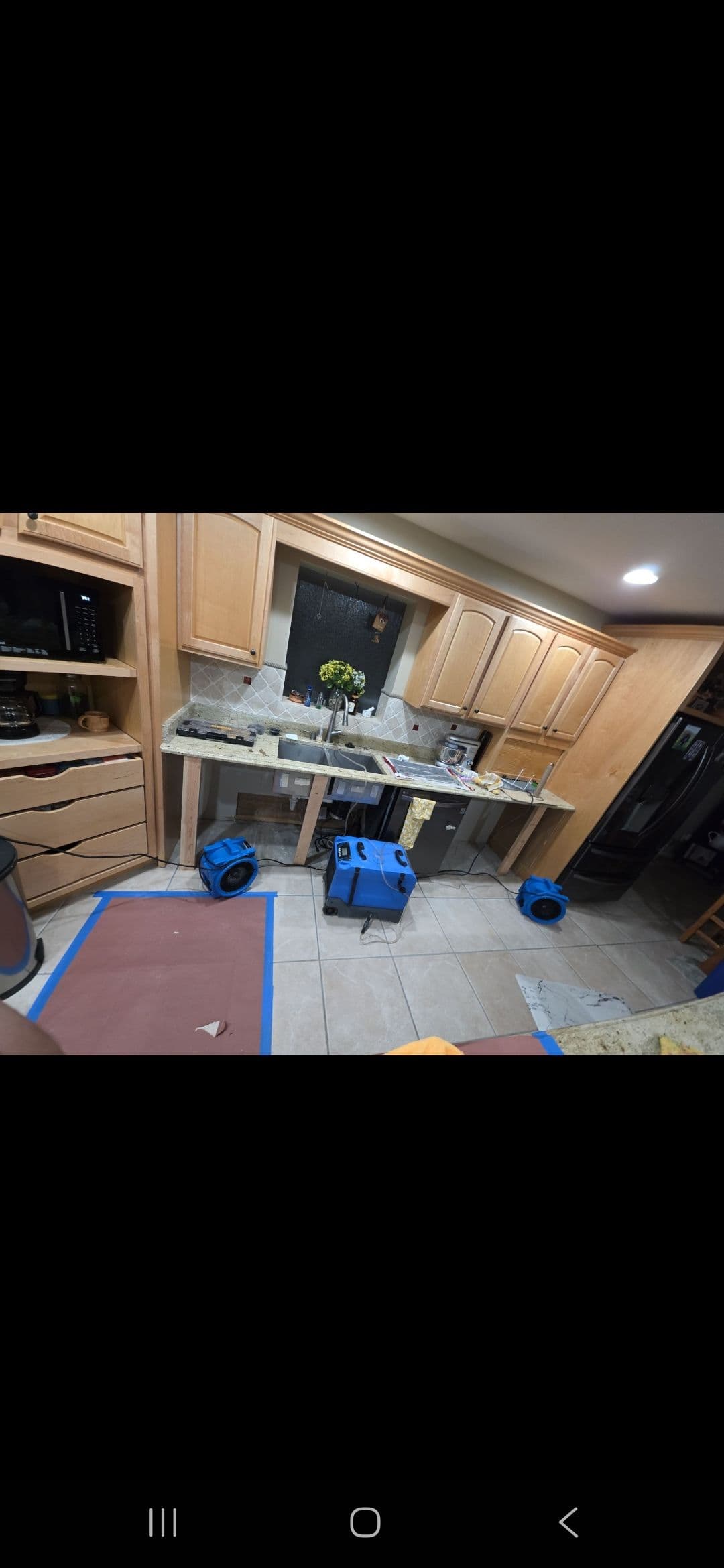 Project From Water Damage to Stunning Kitchen Transformation image