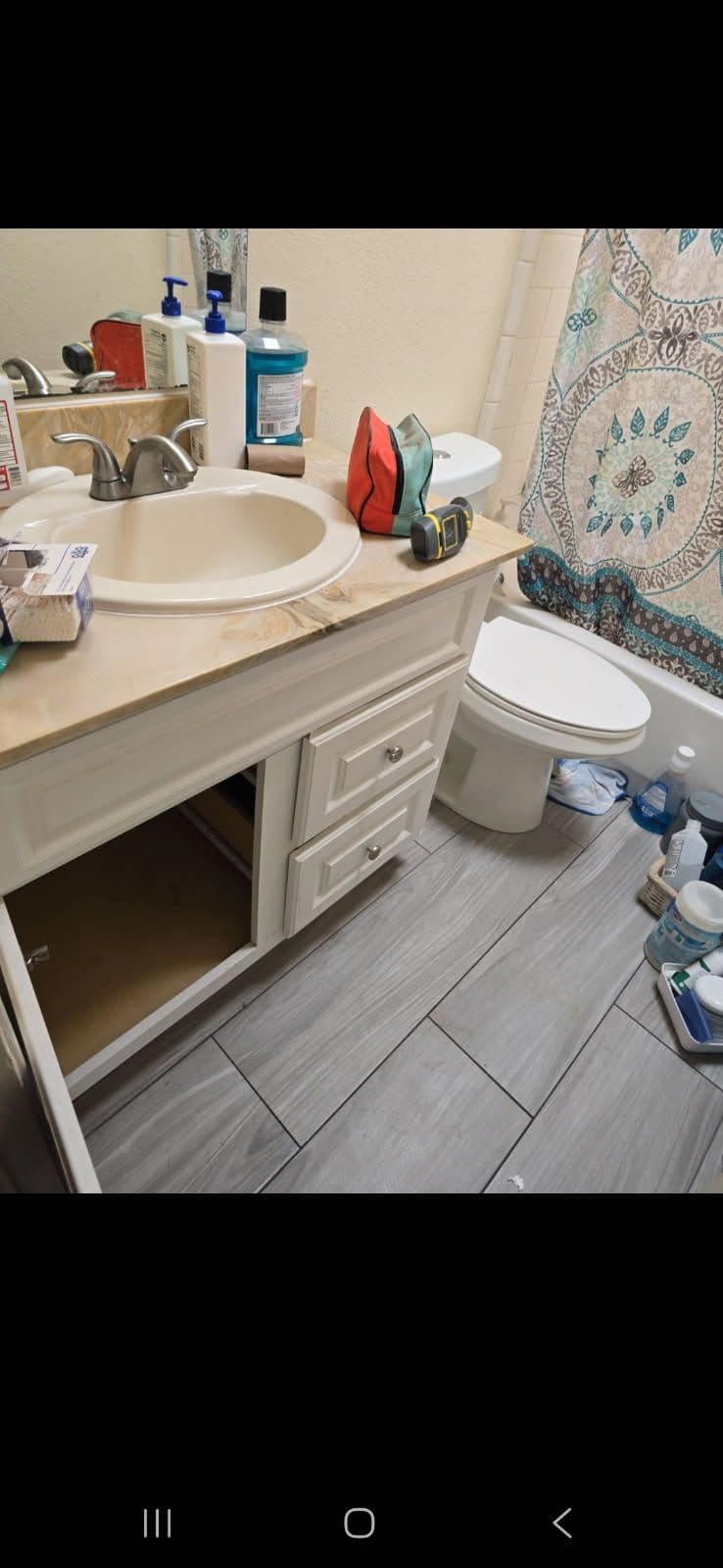 Project Bathroom Leak Solution in Action with Safety Measures image