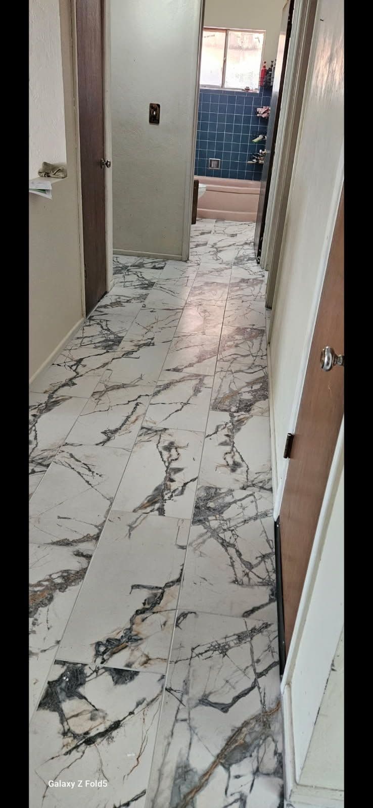 Stunning Marble Tile Makeover for Veteran Home