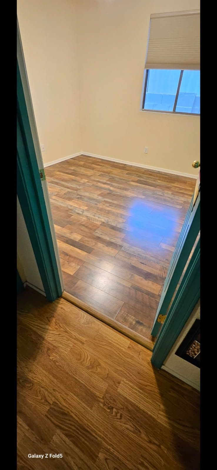 Project Room Transformation with Modern Wood Floors image