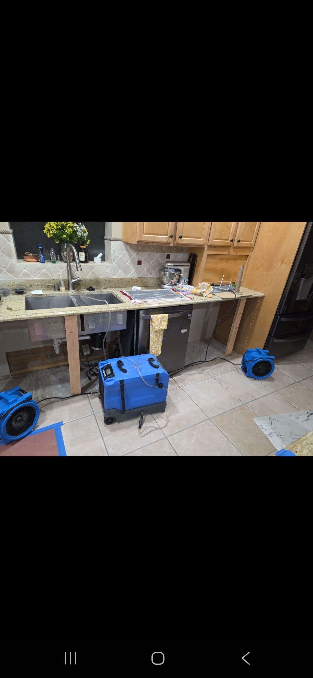 Gallery photos for From Water Damage to Stunning Kitchen Transformation: Image #1